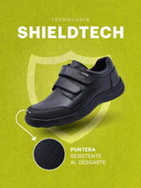 Bota para niño en color verde con tecnología Shieldtech en la puntera.