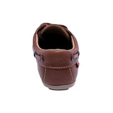 MOCASÍN AUDAZ PARA NIÑO COLOR CAFÉ CLARO DE PIEL MALAGA CON AGUJETA