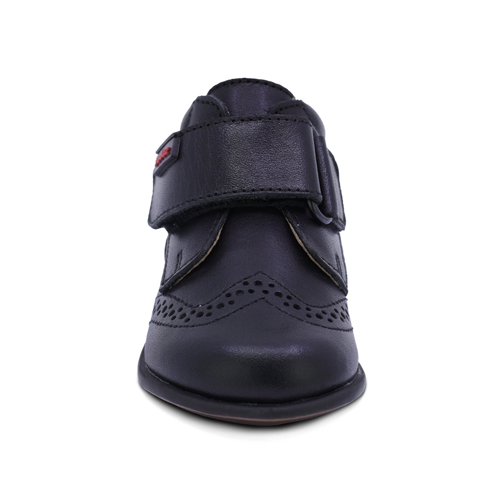 BOTITA AUDAZ PARA NIÑO DE PIEL COLOR NEGRO TOMY CON TIRA DE CONTACTO