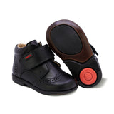 BOTITA AUDAZ PARA NIÑO DE PIEL COLOR NEGRO TOMY CON TIRA DE CONTACTO