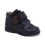 BOTITA AUDAZ PARA NIÑO DE PIEL COLOR NEGRO TOMY CON TIRA DE CONTACTO