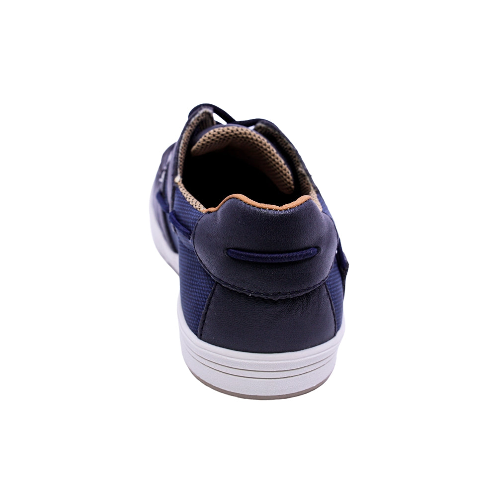 MOCASÍN AUDAZ PARA NIÑO COLOR AZUL MARINO DE PIEL STEVE CON AGUJETA