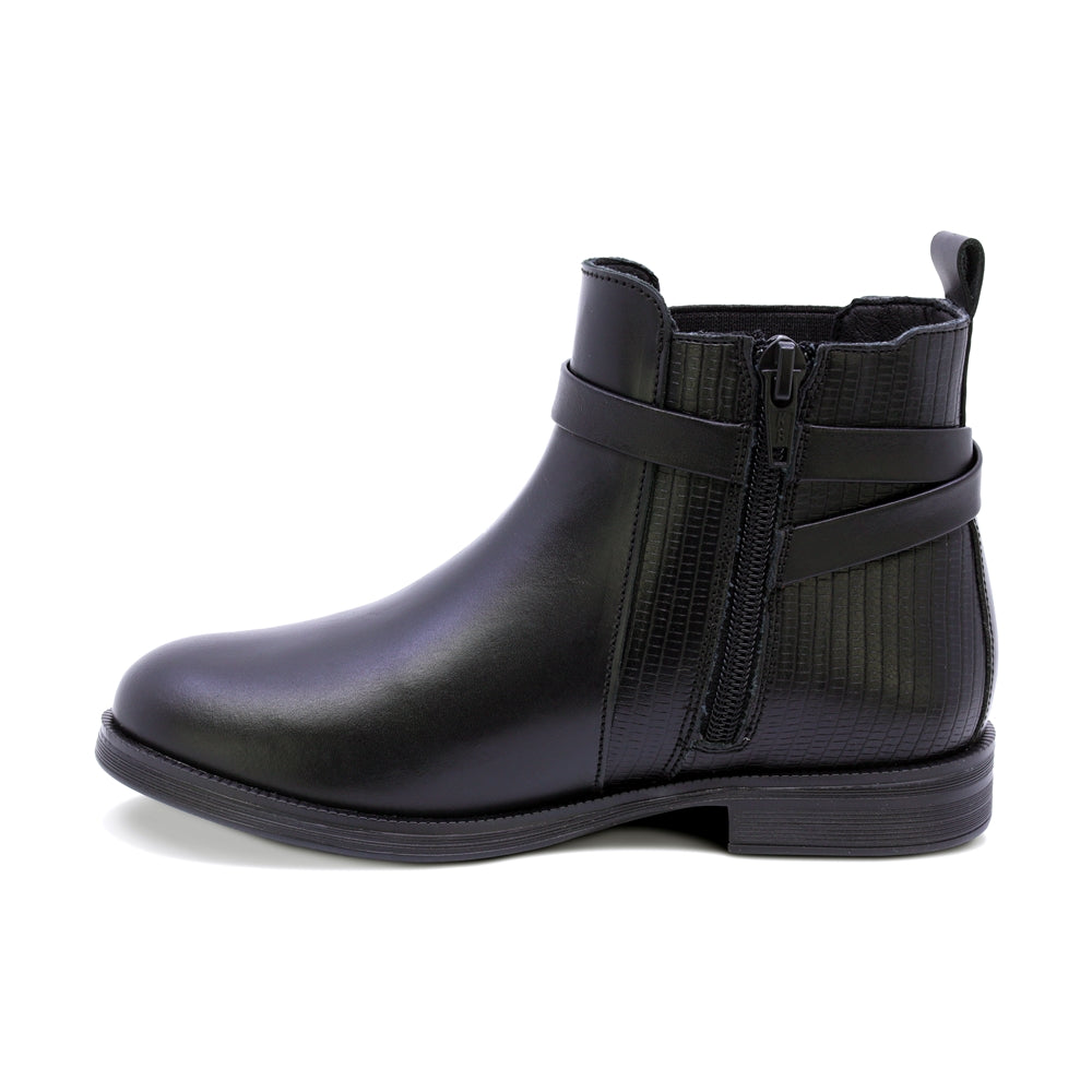 BOTA COQUETA PARA NIÑA DE PIEL COLOR NEGRO CANUTA CON TIRAS DECORATIVAS